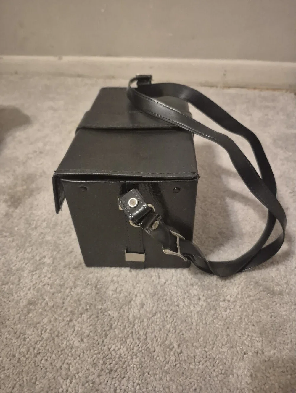 Black Camera Accessory Case with Interior Dividers and Shoulder Strap